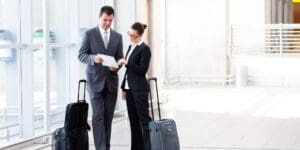 business traveler at airport with insurance